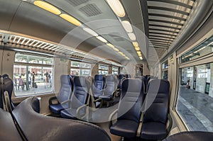 View of the interior of a train with empty seats