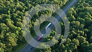 View of the interregional highway. The concept of cargo delivery throughout the country. A white truck on a road that