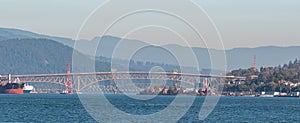 View of Iron Workers Memorial Bridge and North Vancouver Mountains in Vancouver BC