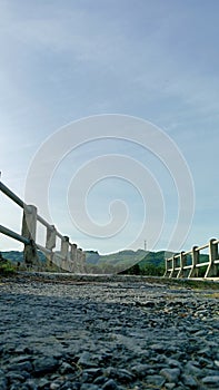 view of irrigation bridge with mountains behind