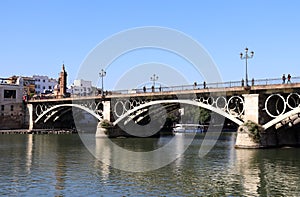 View of the Isabel II Bridge popularly called Puente de Triana in Seville, Spain.