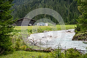 View on isar river and mountains near the isar origin in scharnitz, austria