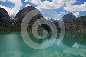 View on Iskander Kul blue mountain lake in the Fan mountains, Tajikistan