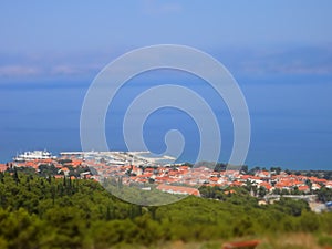 View from Island Brac, Croatia, Europe. Ferry, Seaview, Adriatic, Horizon and Trees in Tilt shift