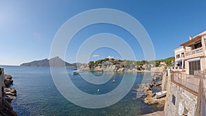 View on the island Sa dragonera covered with green forest surrounded by Mediterranean sea water, Mallorca, Balearic Islands, Spain