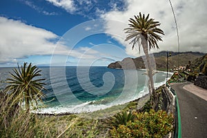 View of the island of Tenerife from Santa Catalina beach. Huge concrete piers for davit and the ruins of the old Hermigua port in