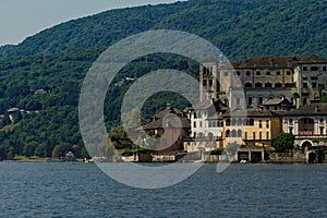 View on the isle of San Giulio, point of interest of Orta's Lake in Italia