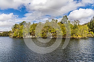 A view of an islet on Loch Katrine in the Scottish Highlands