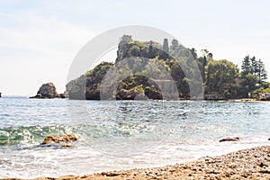View of Isola bella, a small island near Taormina, Sicily photo