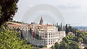 View  of the Istituto Sorelle della Sacra Famiglia from the observation point Punto panoramico Castel S. Pietro located on the photo