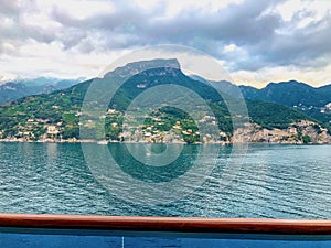 View of the Italy Amalfi coast from a cruise ship balcony before sunrise