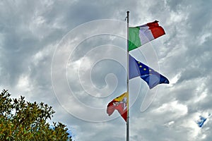 View of Italy, European Union and Sicily Waving Flags
