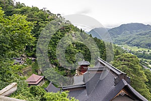 View of japanese buddhist temple in Yamadera with beautiful land