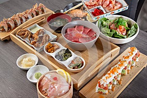 Japanese seafood platter, sushi rolls, nigiri, rice bowl