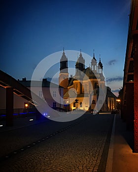 View from Jordan Bridge to Pozna? Cathedral at night in Pozna?, Poland, June 2019 photo