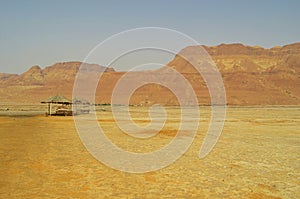 View of the Judean mountains and the coast from the salt of the Dead Sea