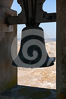 View of Juromenha castle window and bell in Alentejo landscape, Portugal