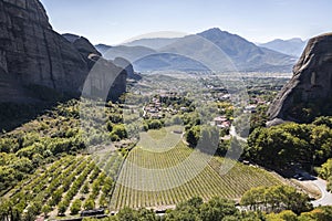 View on Kalabaka town from miraculous monastery on rock formation, Meteora, Greece, beside the Pindos Mountains