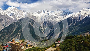 View of Kalpa village and Kinnaur Kailash sacred peak 6050 m at sunrise.