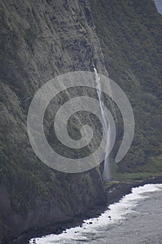 View of Kaluahine Falls from Waipio Valley Lookout at Waimea on Big Island in Hawaii