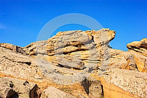 View of the Kamyana Mohylain is an archaeological site, encompasses a group of isolated blocks of sandstone with petroglyphs near