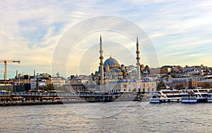 View of Karakoy bridge, yeni camii (new mosque), historical old peninsula istanbul photo