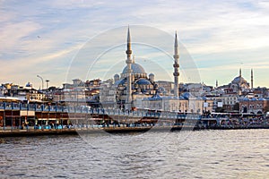 View of Karakoy bridge, yeni camii (new mosque), historical old peninsula istanbul photo