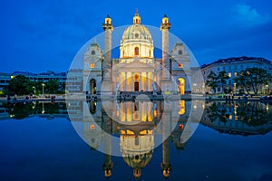 View of Karlskirche church at night in Vienna city, Austria