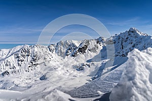 View from Kasprowy Wierch at Swinica mountain peak at winter