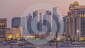 View from Katara Beach day to night timelapse in Doha, Qatar, towards the West Bay and city center