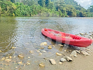View of a kayak parked on the river photo