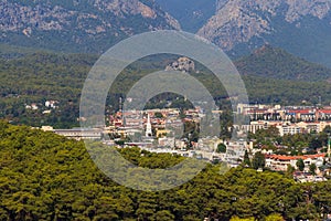 View of Kemer town on a coast of the Mediterranean sea in Antalya province, Turkey. Turkish Riviera. View from mountain
