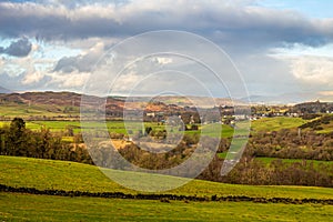 A view of the Ken valley landscape in the Glenkens, with Dalry in the distance