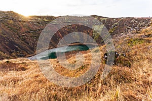 View of Kerid crater volcanic lake in Iceland photo