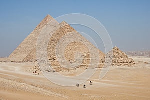 View on Khafre, Menkaure and pyramids of Queens from desert.