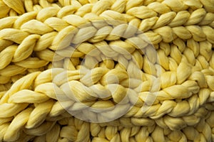 View of the knitted yellow merino wool plaid