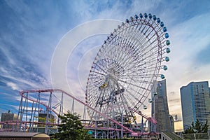 View from Kokusai bridge of Cosmo Clock 21 Big Wheel at Cosmo World Theme Park, overlooking the Diving Coaster Vanish in