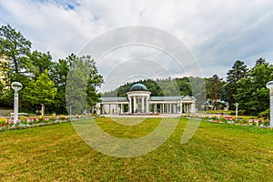 View on the Kolonada building from park in the Czech spa town Marienbad in summer