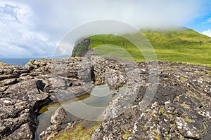 View of Koltur island in Faroe Islands, North Atlantic Ocean. Nordic Natural Landscape