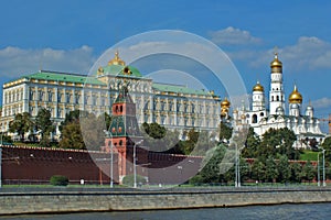 View of Kremlin wall with towers and Cathedrals photo made from opposite bank of the river Moscow photo