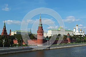 View of Kremlin wall with towers and Cathedrals photo made from opposite bank of the river Moscow photo