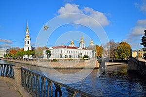 The view from the Kryukov canal quay on the Orthodox and St. Nicholas Cathedral Krasnogvardeysky bridge Sunny autumn day