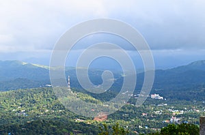 View of Kumily among Western Ghats and Cloudy Sky from Ottakathalamedu View Point, Kerala, India...