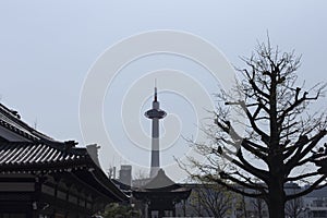 View of Kyoto tower from Higashi Hongan-ji Temple on a sunny day