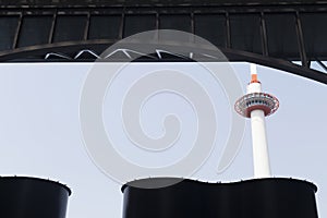 View of Kyoto tower from inside Kyoto central station on a sunny day