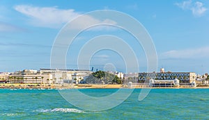 view of la caleta beach with white building of an old bathhouse in the spanish city cadiz...IMAGE