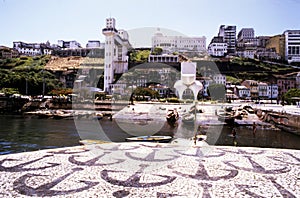 View of the Lacerda elevator and the All Saints Bay in Salvador, Bahia, Brazil port with fishboat