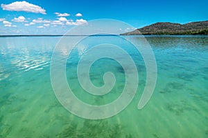 View on Lago Peten Itza with crododile shaped hill, El Remate, Guatemala