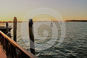 The lagoon of Venice at sunset, seen from the island Lido di Venezia. Italy. photo