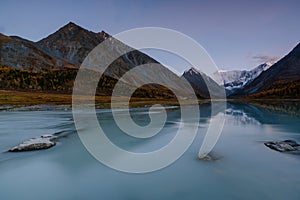 View from lake Akkem on mountain Belukha near board between Russia and Kazahstan during golden autumn